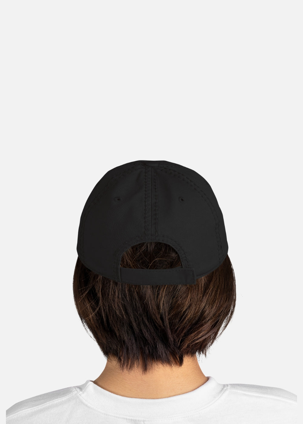 Rear view of woman wearing breathable cotton twill black cap – rugged and adjustable fit, perfect for festivals and streetwear.