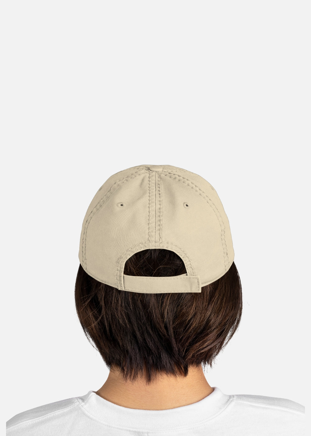 Woman wearing khaki distressed streetwear baseball cap – adjustable cotton fit, ideal for laid-back street fashion.