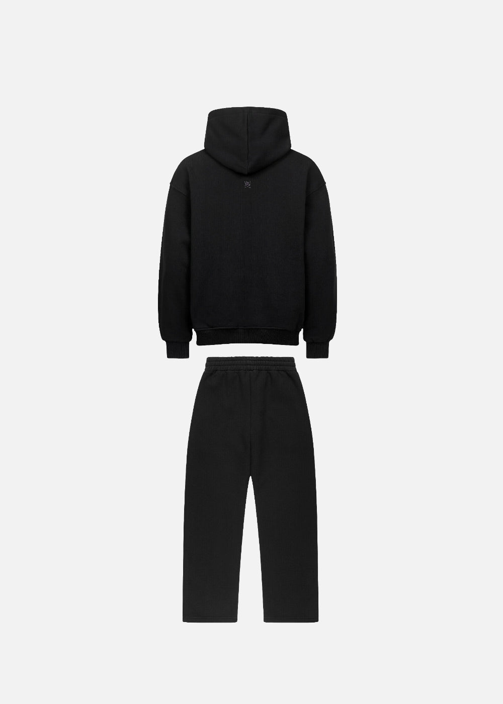 Back view of MAXOMclo Purple Obsidian urban fashion tracksuit set in all-black with purple lettering. Premium oversized hoodie and sweatpants for a bold streetwear look.