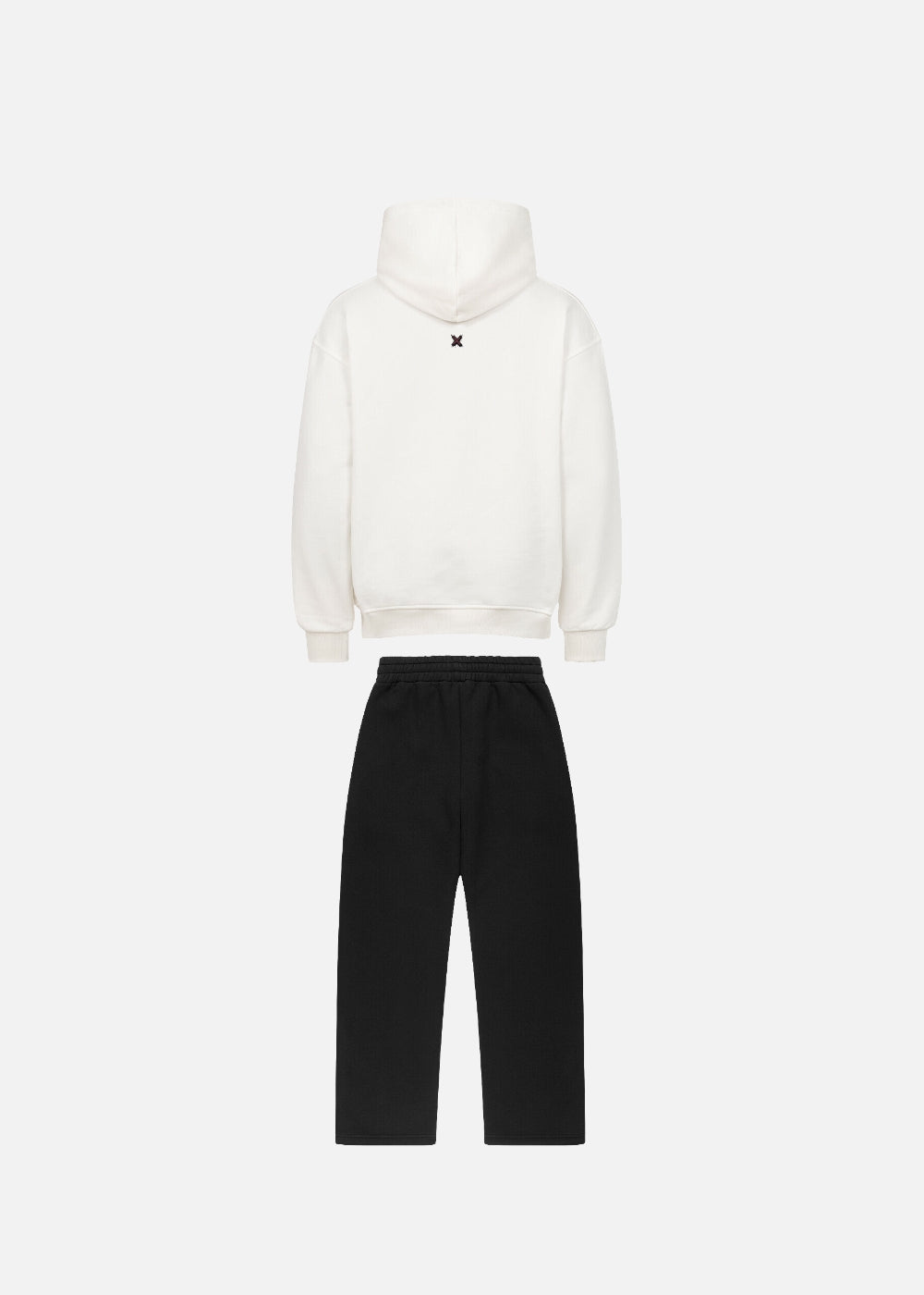 Back view of MAXOMclo Red Obsidian streetwear set. White oversized hoodie paired with black relaxed-fit sweatpants – premium unisex urban fashion for men and women.