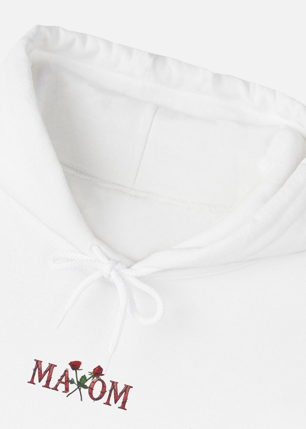 Detailed close-up of white hoodie showing rose print and inspirational back quote