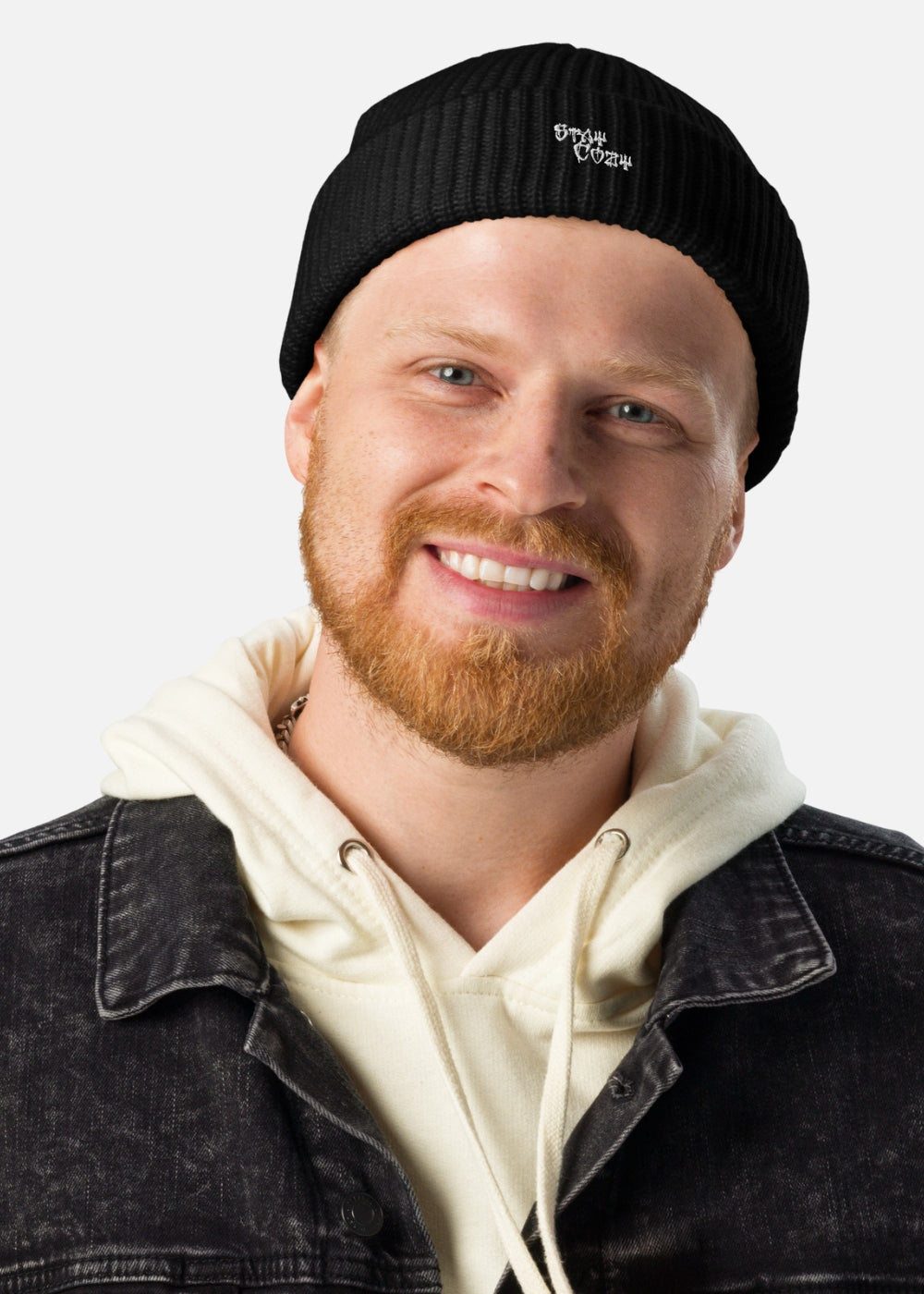 Male model wearing black Stay Cozy urban beanie – minimalist fisherman-style hat for cold-weather street looks
