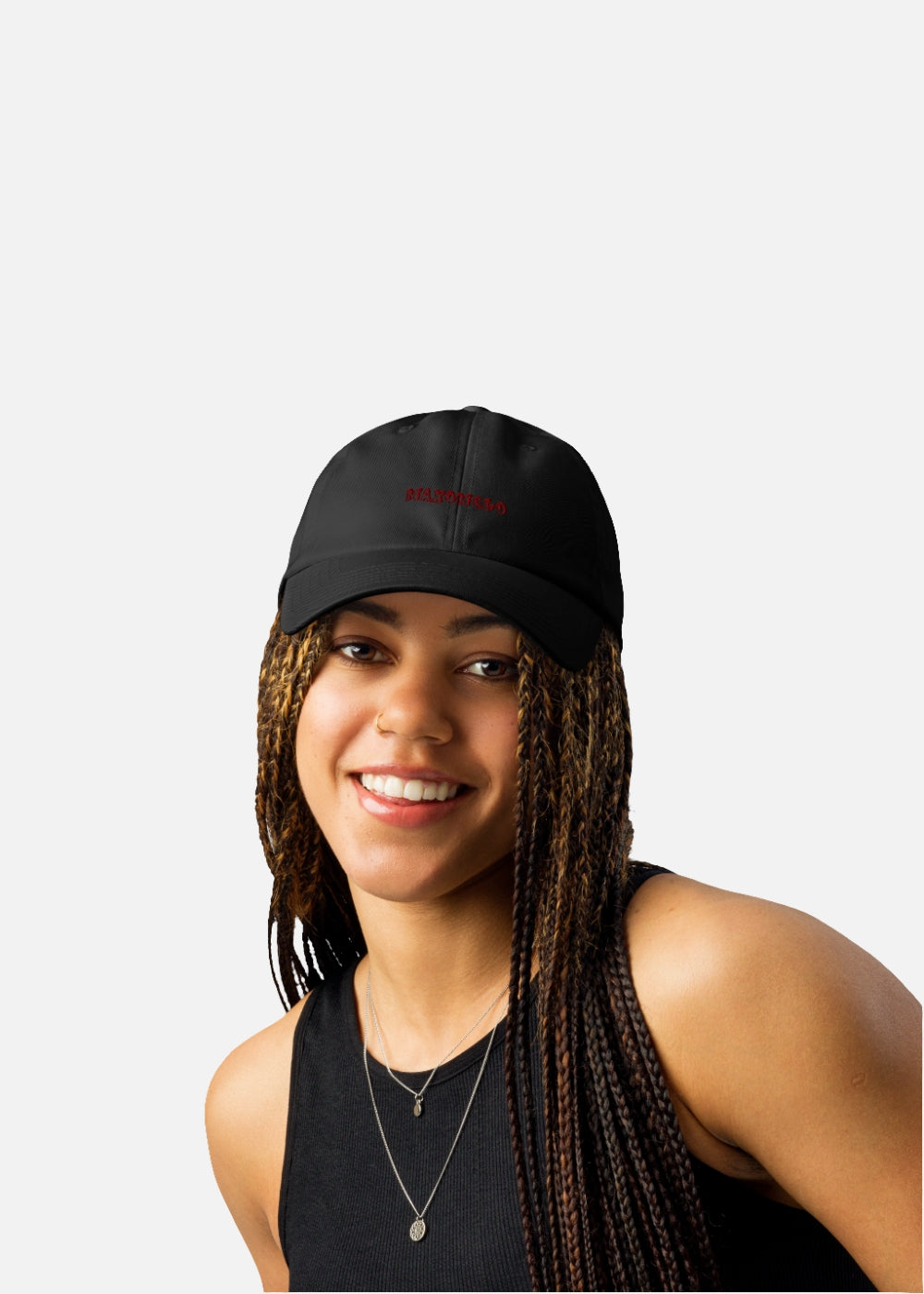 Female model styled with a black performance streetwear cap – unisex low-profile design for casual wear.