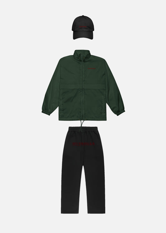 Unisex forest green windbreaker with black joggers & cap – bold urban fashion streetwear combo