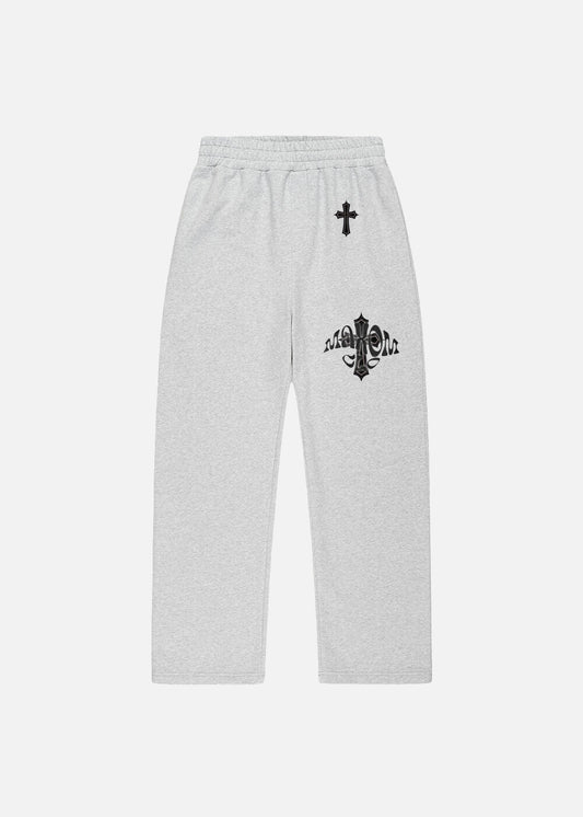 Baggy sweatpants in grey – front view of Elysium streetwear pants by MAXOMclo. A minimalist, comfortable bottom piece for a premium oversized tracksuit for men.

