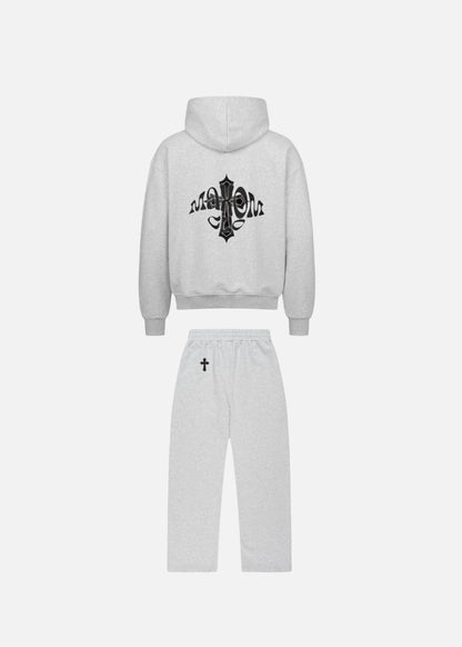 Back view of minimalist grey streetwear for men – MAXOMclo Elysium tracksuit featuring oversized hoodie and baggy sweatpants. A high-quality men’s hoodie and sweatpants set for a clean, urban look.


