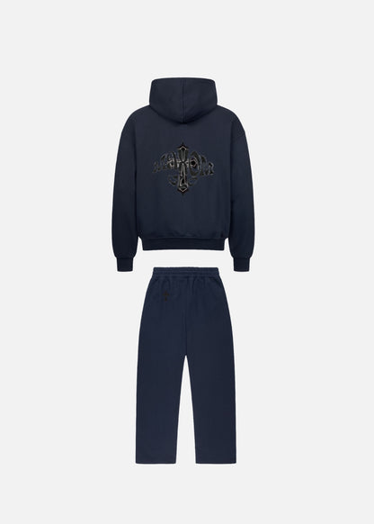 Back view of luxury men’s streetwear tracksuit – MAXOMclo Elysium navy blue hoodie and sweatpants in oversized relaxed fit. Perfect for modern streetwear fans and loungewear lovers.

