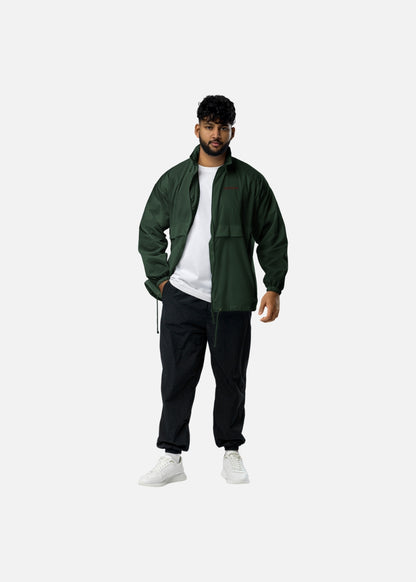 Urban male model wearing green windbreaker – breathable and ethical fashion jacket