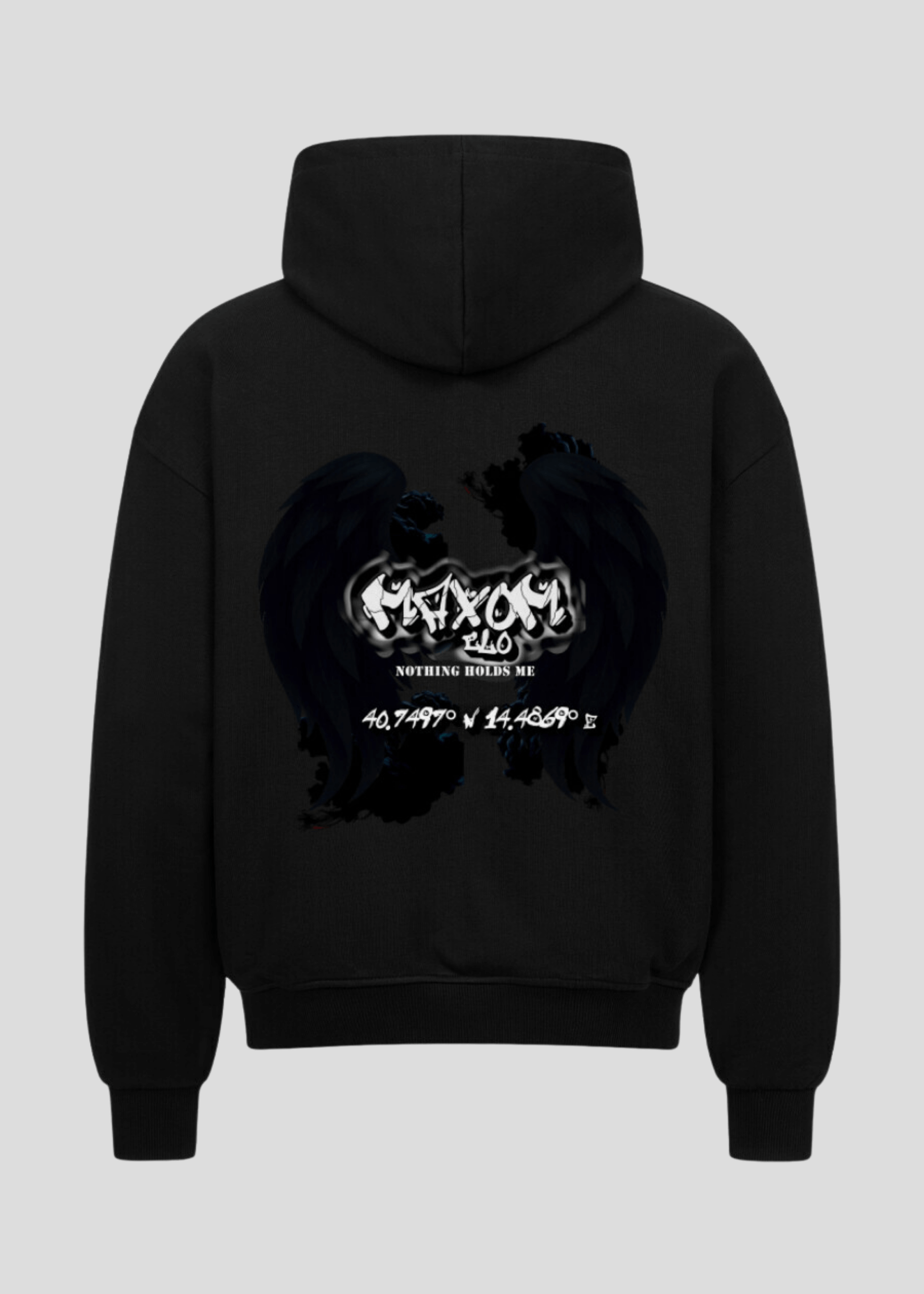 Oversized black streetwear hoodie with gothic angel wings and coordinates backprint – “Nothing Holds Me” motivational slogan in grunge style.