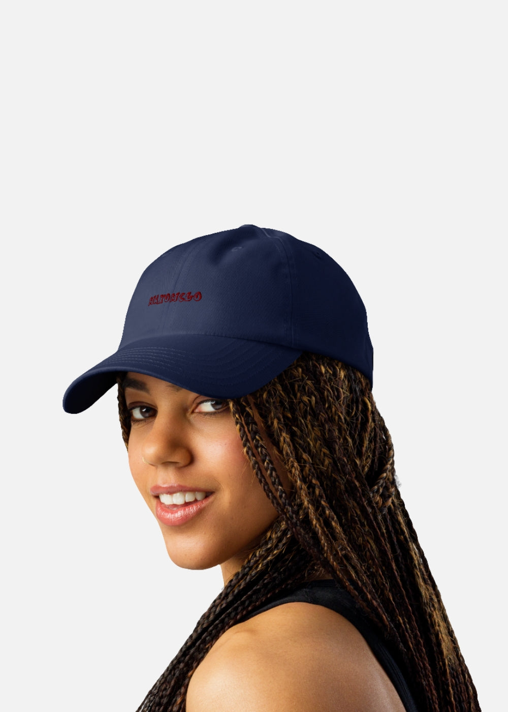Female model with navy HeatGear cap – unisex streetwear cap designed for moisture control and casual street style.