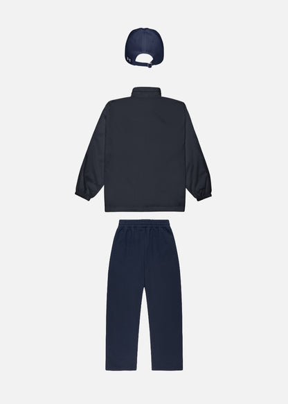 Back view of premium navy streetwear bundle – unisex windbreaker, joggers & baseball cap for daily style