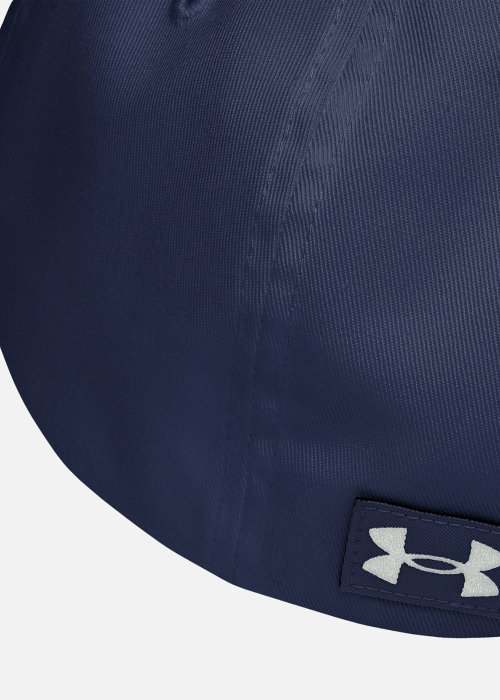 Close-up of the navy cap’s embroidered logo and breathable HeatGear sweatband – premium urban performance cap for everyday wear.