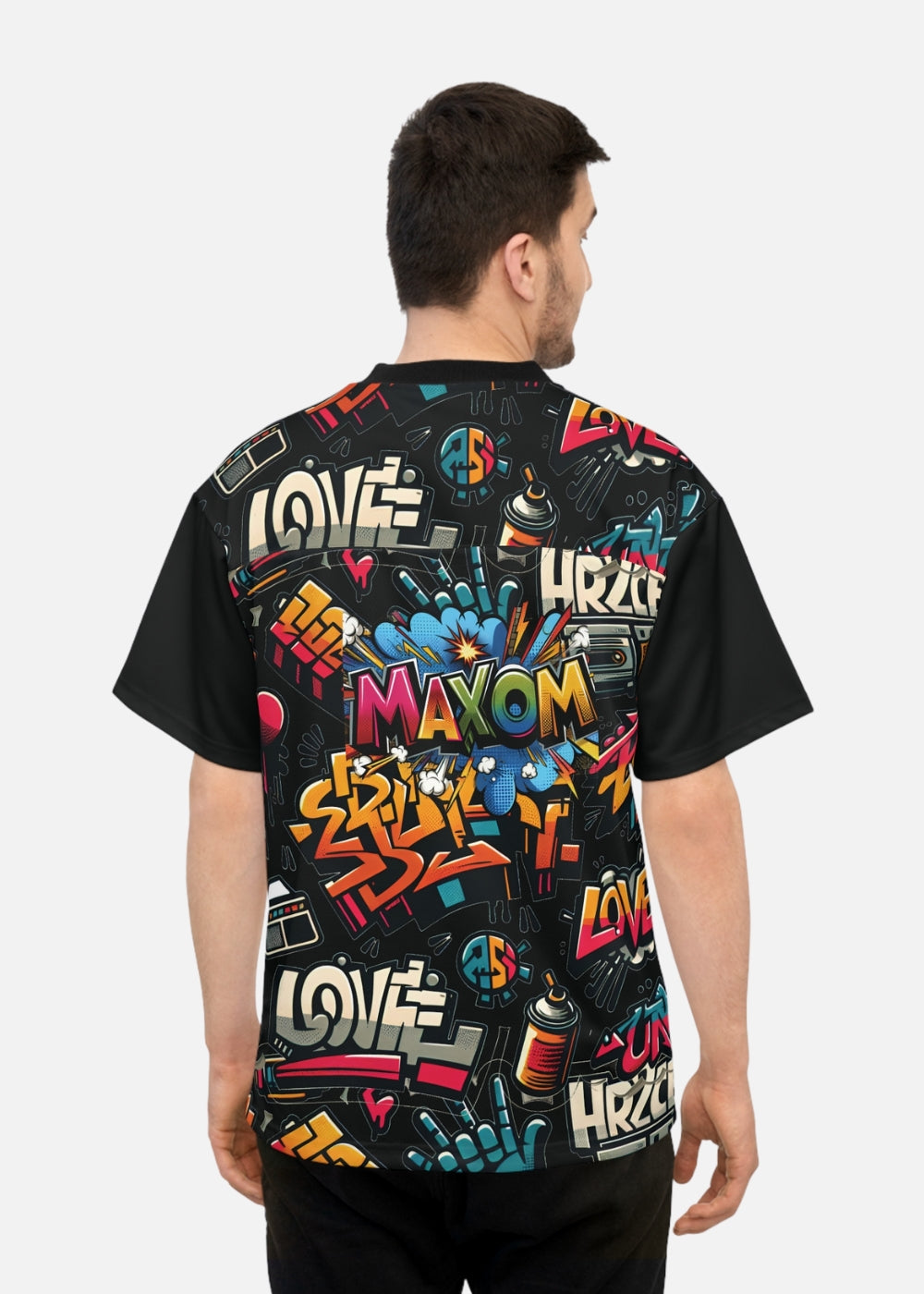 Back view of male model in graffiti shirt – oversized streetwear tee with mesh detail and back logo print