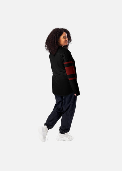 Back view of female model wearing ethical streetwear hockey sweater – black and red minimalist style