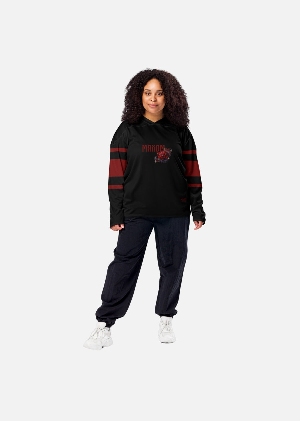 Female model in premium recycled hockey sweater – UPF50+ lightweight unisex streetwear with rose print