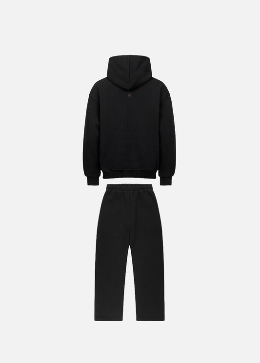 MAXOMclo Red Obsidian streetwear set – back view of oversized black hoodie with red print and relaxed baggy sweatpants. Bold and stylish 380 GSM cotton look.

