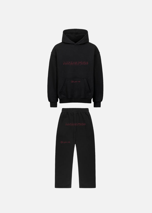 Front view of MAXOMclo Red Obsidian set with black hoodie and black baggy joggers. Premium unisex streetwear set in a bold red-on-black urban style.

