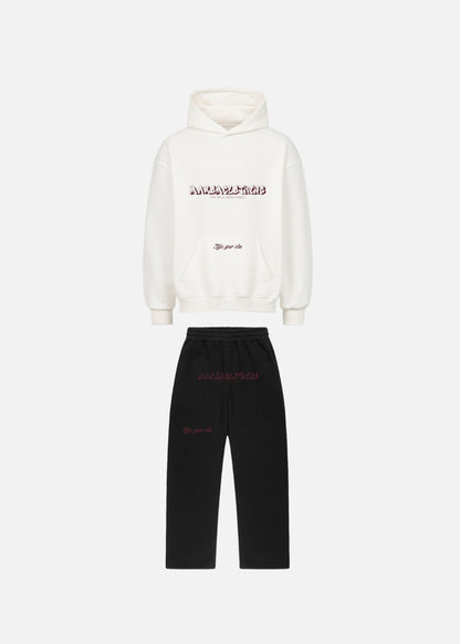 MAXOMclo Red Obsidian premium streetwear set with white oversized hoodie and black baggy sweatpants. Heavyweight 380 GSM cotton, bold red print, and relaxed urban fashion fit.

