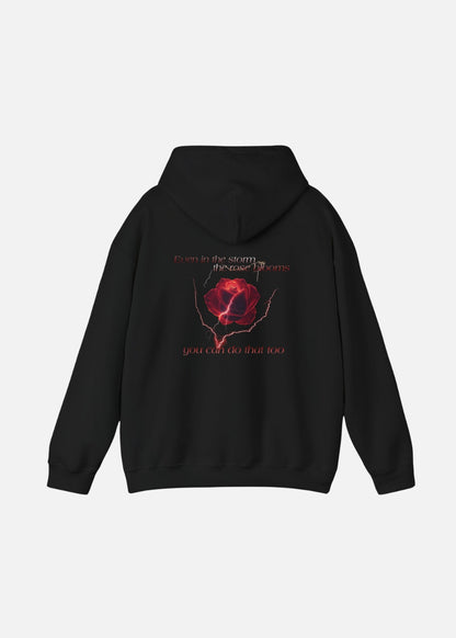 Unisex black hoodie with motivational message and rose graphic on back – bold streetwear for everyday confidence