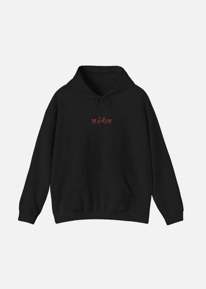 Black rose graphic hoodie front view – unisex motivational streetwear hoodie with floral print by MAXOMclo