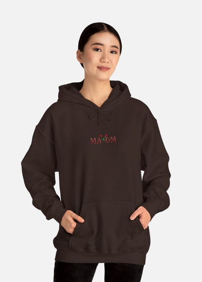 Front view of female model wearing brown floral hoodie – inspirational quote streetwear for women
