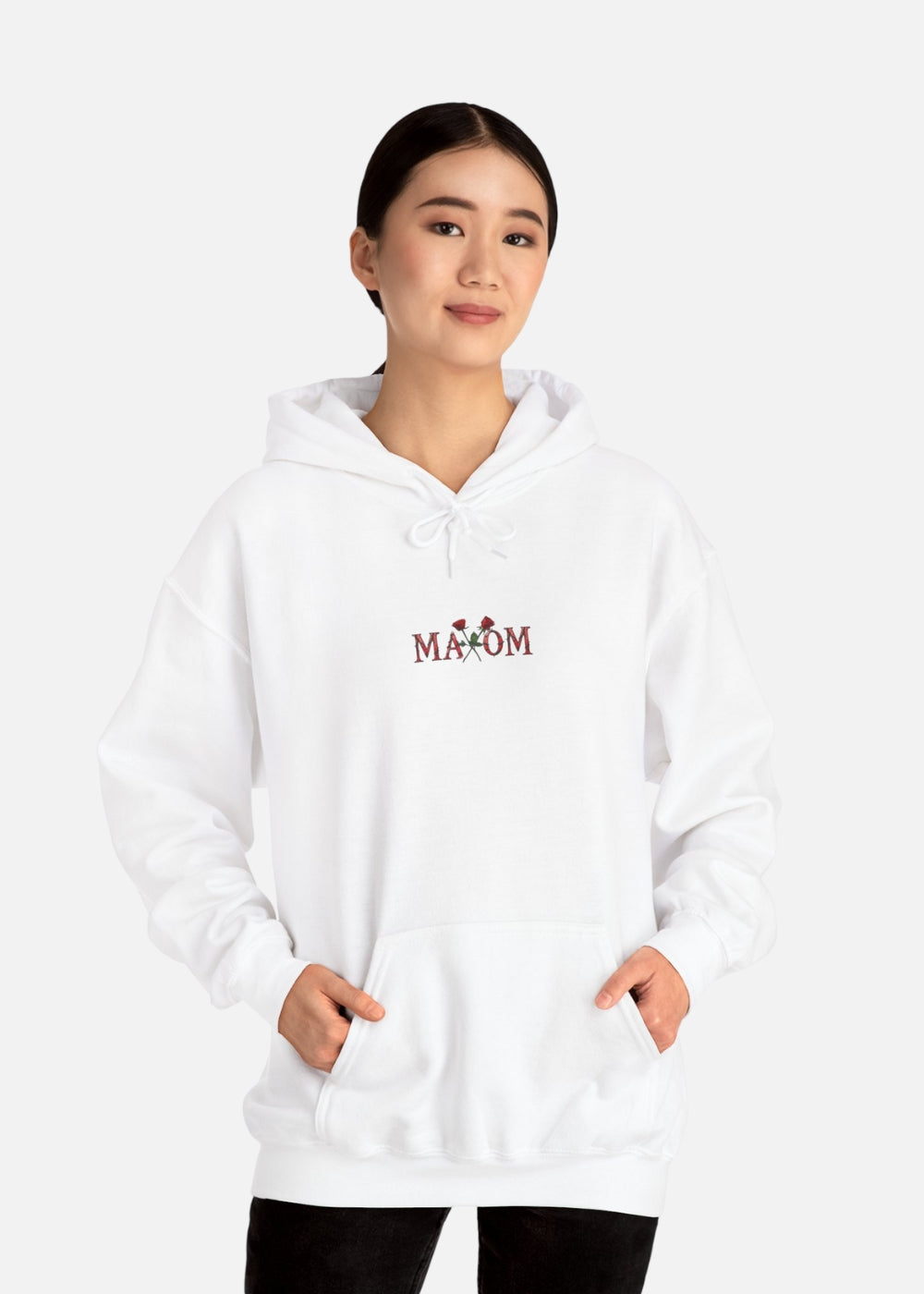Female model wearing white rose motivational hoodie – minimalist streetwear for everyday style