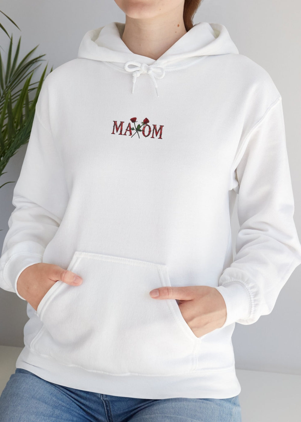 Real life female model in white rose graphic hoodie – cozy streetwear for modern inspiration