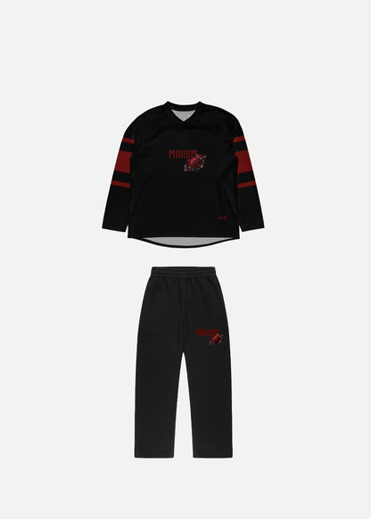 Roses streetwear outfit front view – unisex oversized sweater and baggy sweatpants set with bold red floral design by MAXOMclo