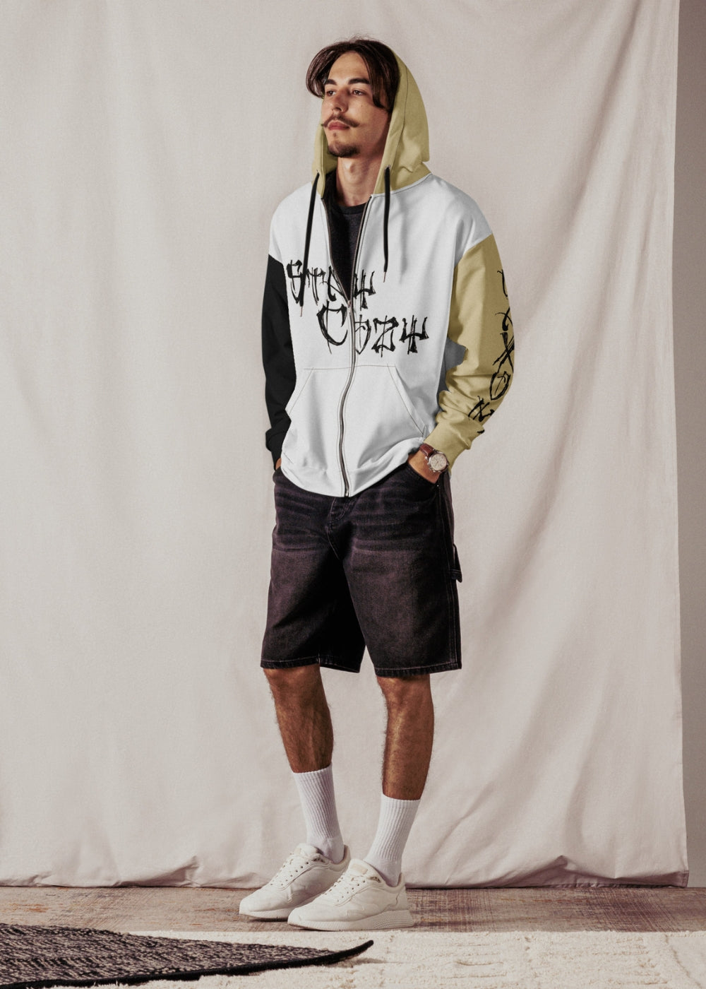 Male model in real-life street setting wearing recycled MAXOMclo zip hoodie – relaxed eco-fashion look